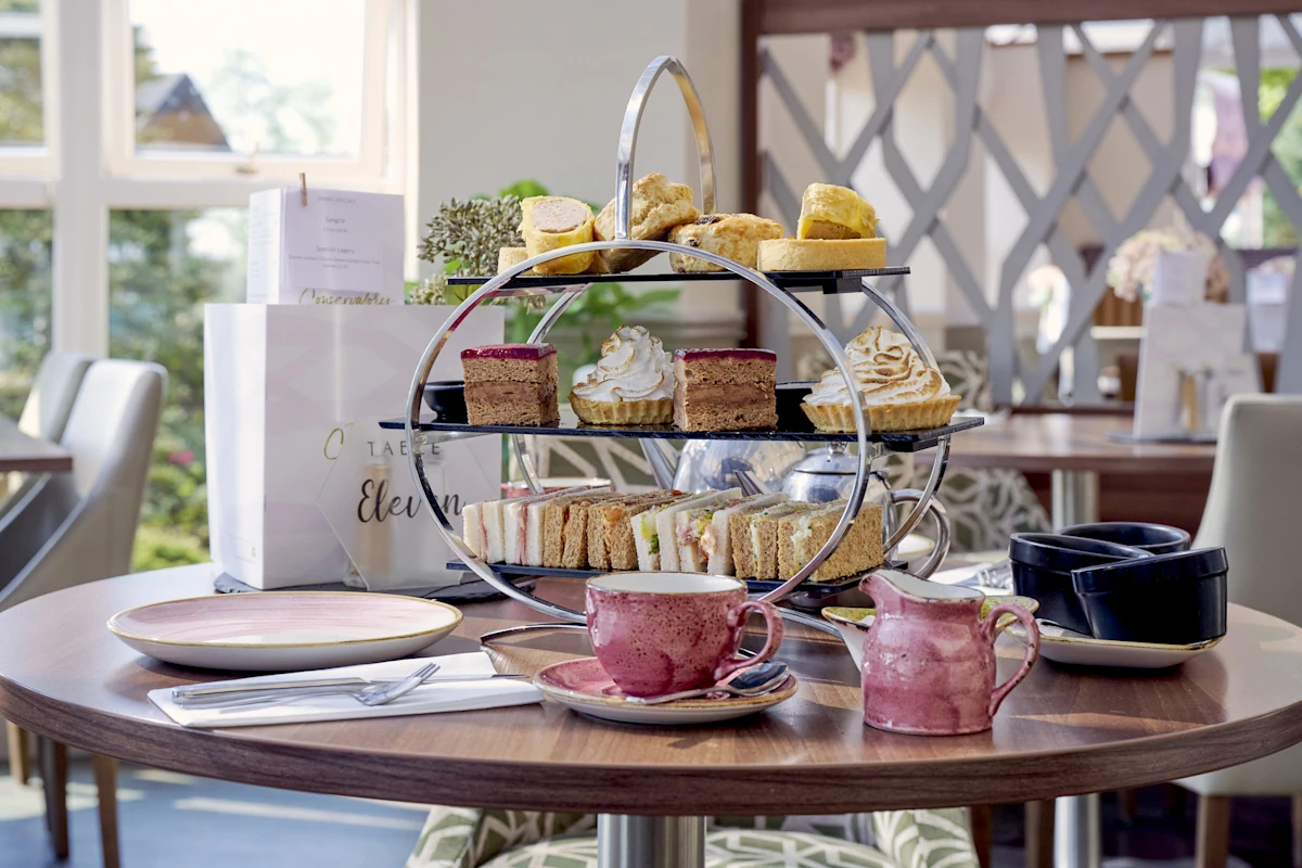 Display of cakes and sandwiches